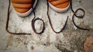 Photo of the Word LOVE Arranged with the Use of Shoe Laces