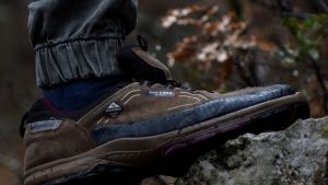 A Person Wearing Brown Hiking Shoes