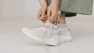 Close-up Photo of tying of Shoe Laces