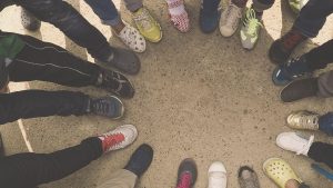 Group of People Standing on Pavement