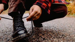 Person Tying Her Shoelaces