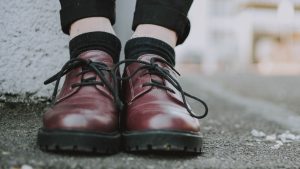 Person Wearing Leather Shoes