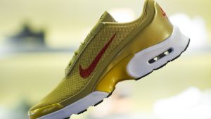 Stylish yellow running shoe in modern store