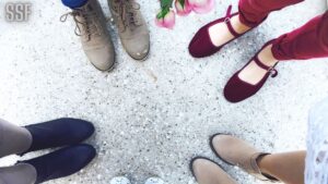 Five Person Wears Footwear at Daytime