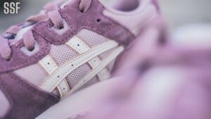 White and Purple Athletic Shoe