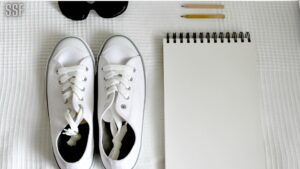 White Sneakers, Notebook, and Sunglasses